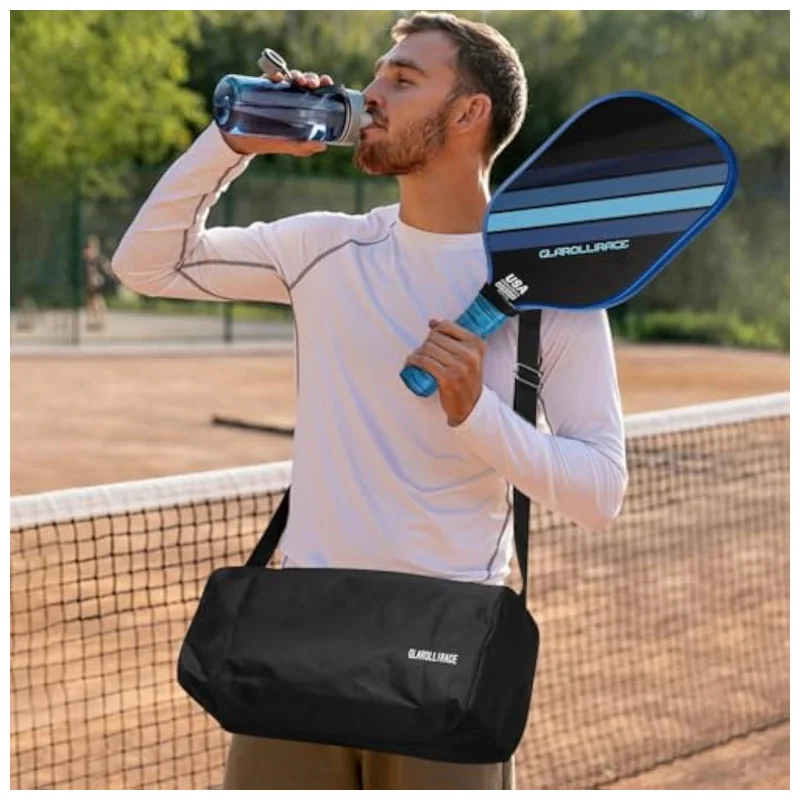 Hand gripping textured pickleball paddle handle during dynamic swing motion