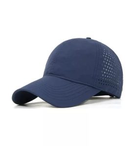 Navy blue custom quick-dry performance baseball cap with laser perforated panels and curved brim, OEM logo cap manufactured for US brands